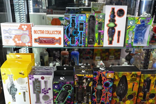 Boxed nectar collectors and concentrate accessories on a retail shelf